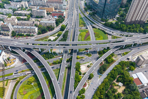 Top‑down aerial shot of complex multi‑level urban highway interchange