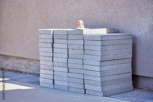 A Stack of Cement Cap Blocks for Landscaping with a Float