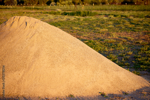Stack of Patio Blocks sitting on a Plywood and a Cement Pad