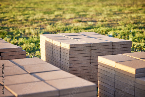Stacks of Patio Blocks on a Wooden Pallet sitting on top of Gravel