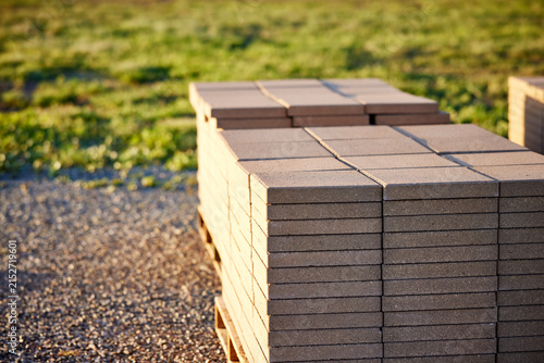 Stacks of Patio Blocks on a Wooden Pallet sitting on top of Gravel