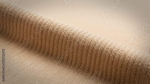 ribbed knit beige sweater fabric texture close up