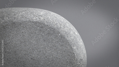 close up of a smooth grey stone pebble texture