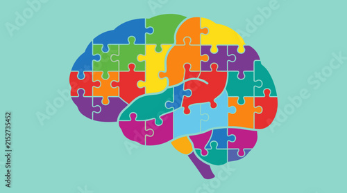 Human brain shaped puzzle made of colorful jigsaw pieces