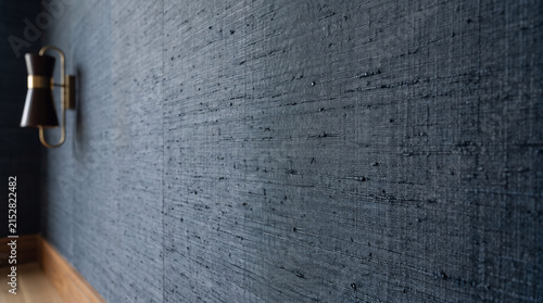 Close-up of textured dark blue wall surface for interior design or background use
