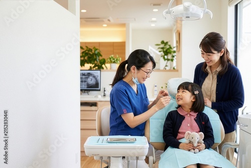 Japanese Girl Having a Dental Checkup with Dentist
