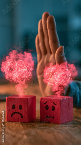 Stop Negative Energy: A hand is held up in a gesture to stop, blocking two red blocks with sad faces and red smoke, symbolizing the rejection of negative emotions or thoughts.