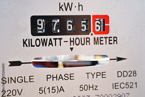 Electric measuring power meter for energy cost at home and office.