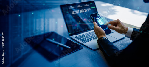 Businessman use phone to login with scanning unlock,password and access to financial banking data network.Biometric identification cyber security protect business transaction from online cyber attack