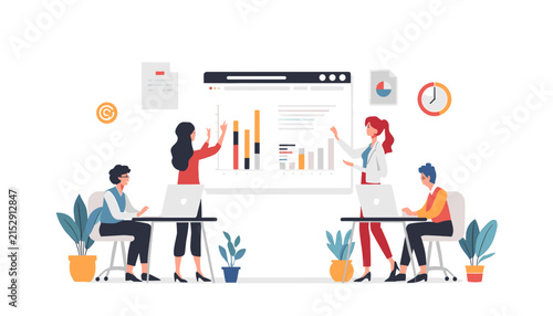 Professional business team collaborating on a project presentation in a modern office environment.