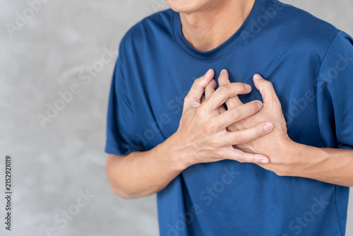 Принти на полотні hand hold chest with heart attack symptoms, man have chest pain caused by heart