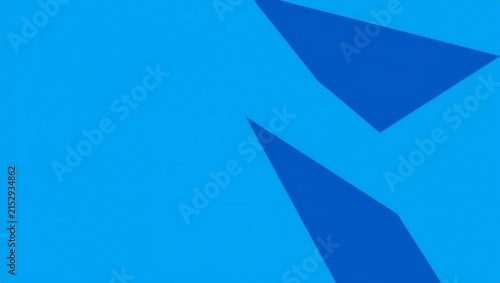 Abstract blue geometric shapes with sharp triangles on a bright cyan background