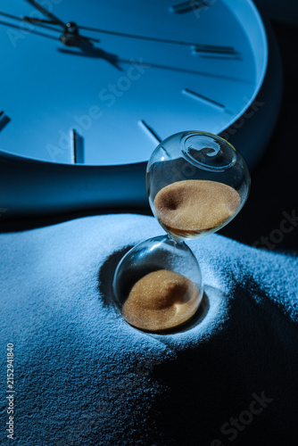 Hourglass with sand flowing...