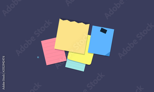 Colorful sticky notes stacked on dark background