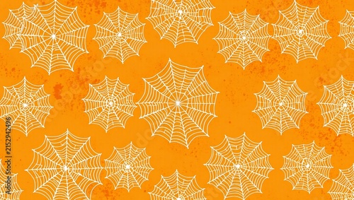 Seamless pattern with hand drawn spider webs on bright orange background for halloween celebration