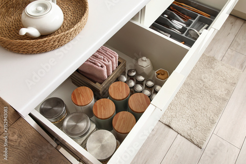Open kitchen drawers with d...