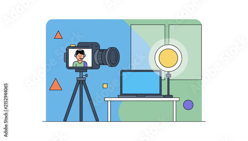 Professional home studio workstation for content creators featuring a camera on a tripod laptop and ring light.