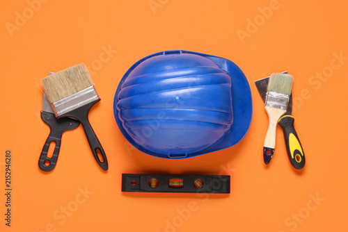Blue hardhat with brushes, ...