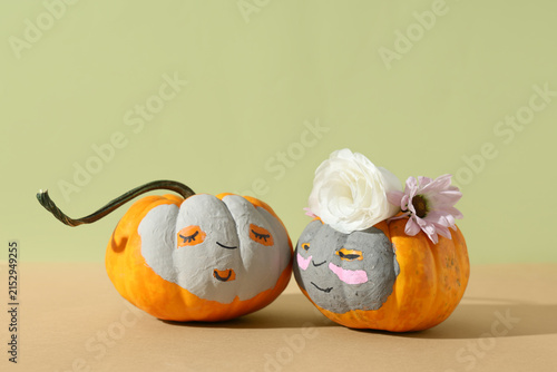 Pumpkins with drawn faces, ...