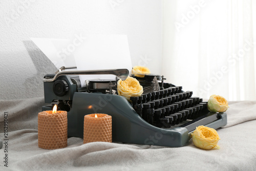 Vintage typewriter with pap...