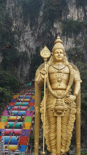 Golden Murugan Statue and Batu Caves Malaysia Landmark