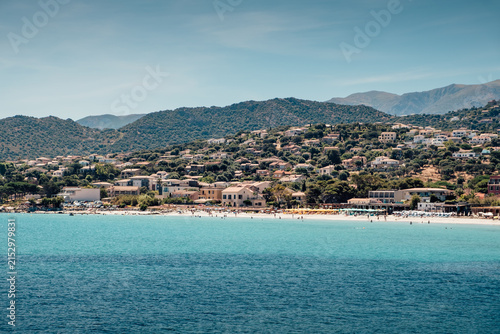 White sand beach of Ile-Rousse to enjoy the sun in Corsica