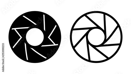 Camera Aperture Symbols: Two abstract circular graphic representations, one black and one outlined, illustrate the mechanics of a camera's diaphragm and its adjustable opening.