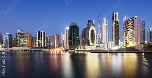 Dubai skyline with skyscraper and reflection in canal - nice cityscape in United Arab Emirates
