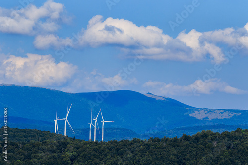 Wind turbines among the Carpathian Mountains. Ecological energy concept in Ukraine