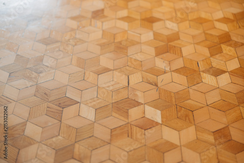 Handmade geometric wooden flooring with natural wood texture