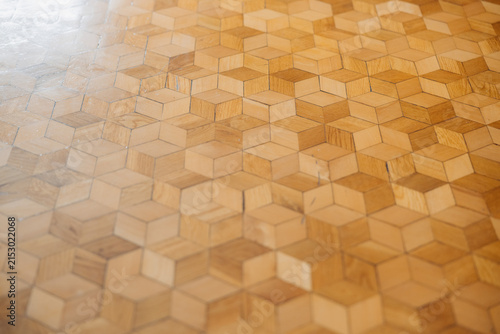 Handmade geometric wooden flooring with natural wood texture