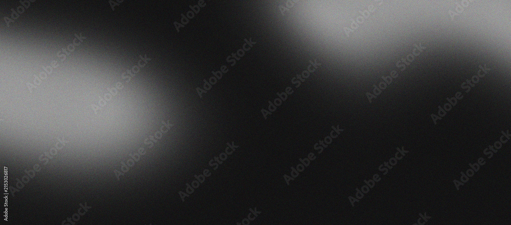Fototapeta premium Abstract dark background with soft light flares and grainy texture