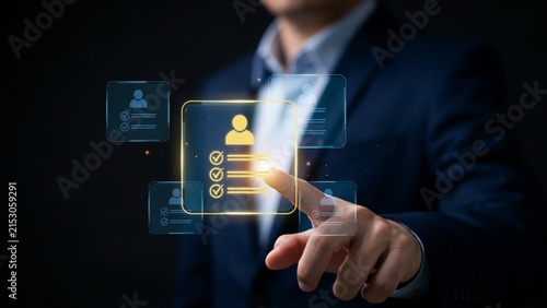 Businessman touching glowing digital interface with user profile