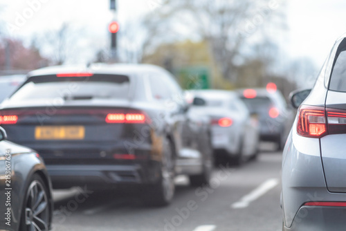 Traffic jam congestion with rows of cars on highway in rush hour