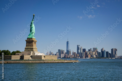 Statue of Liberty on Liberty Island with Manhattan Skyline in New York City