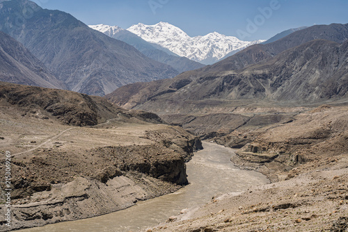 Scenic mountain landscape view of Indus river valley and mighty snowcapped Nanga Parbat, Thalich bridge, Astore, Gilgit Baltistan, Pakistan