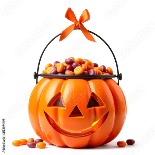 Brightly Colored Halloween Candy in Pumpkin Bucket with Ribbon Decoration for Festive Seasonal Celebrations and Trick-or-Treat Activities