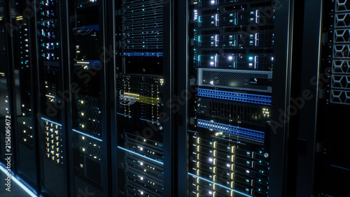 Modern Data Center Server Room. Close up View Through Perforated Cabinet Doors Reveals Stacked Rack Mounted Servers, Patch Panels and Cable Bundles Inside a Data Center Aisle Where Ai Models Train.