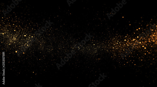 Golden glitter particle trail flowing across black background. Glowing magic dust wave with shimmering bokeh effect