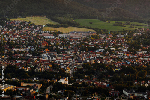Aerial cityscape of Saalfeld town center with historic architecture at golden hour
