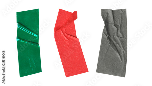 Fotografie Three wrinkled colorful adhesive duct tape strips isolated on white background
