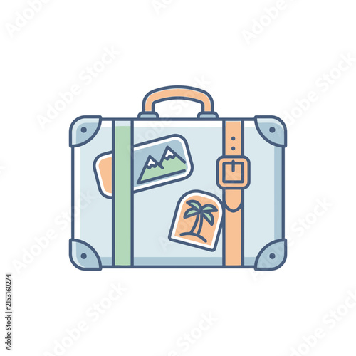 A vintage travel suitcase with decorative stickers on the surface