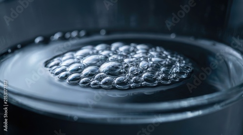 Close Up Water Bubbles on Blue Liquid Surface. Abstract Clean Freshness Background Texture.