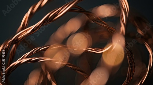 Abstract Copper Wires Background with Bokeh. Twisted Metal Texture and Light. Modern Design Concept.