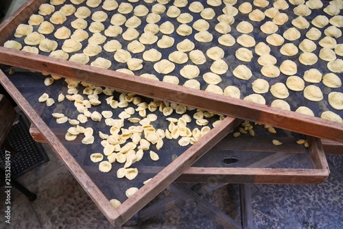 Quadro su tela Italian food traditional production - outdoor drying of home-made orecchiette pugliese pasta in Bari, Apulia