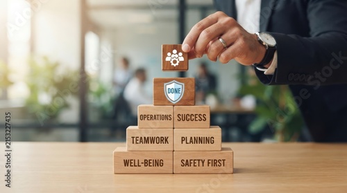 Construction worker elephant stacking success blocks with teamwork