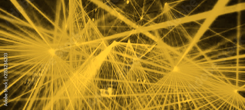 Quadro su tela Complex network of interconnected yellow laser beams creating abstract and vibra