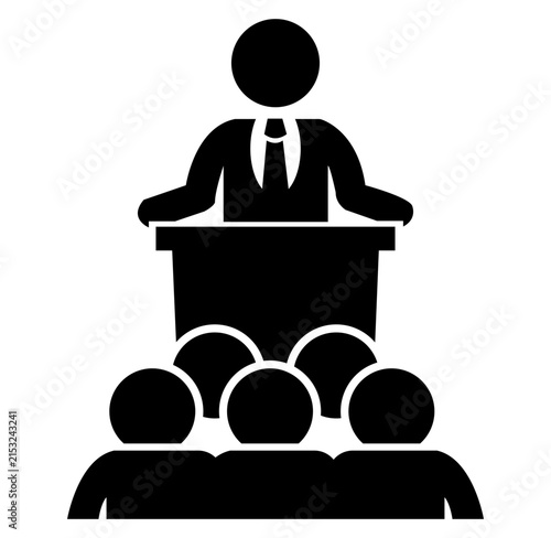 Business professional speaking at podium addressing audience in corporate presentation setting