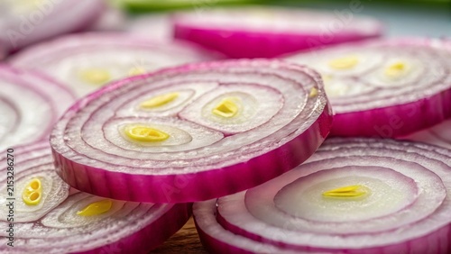 Freshly sliced onion on a micro background showcasing vibrant colors and textures in food preparation
