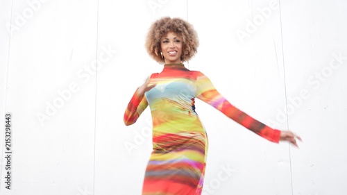 An EyeCatching and Colorful Fashion Shoot Featuring a Stunning Model in a Vibrant Dress